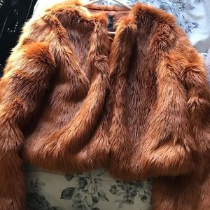 Burnt orange faux fur coat